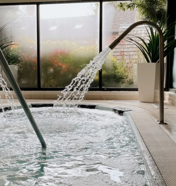 Hydrotherapy pool with water jets in the Moddershall Oaks spa
